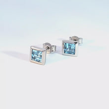 Load and play video in Gallery viewer, 14k White Gold Square Bezel Blue Topaz Stud Earrings (I8851)
