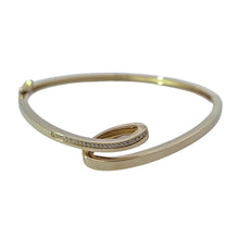 Load image into Gallery viewer, Rhodium or Gold Plated White Sapphire Twisted Bangle Bracelet
