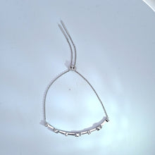 Load image into Gallery viewer, Rhodium Plated Sterling Silver Oval Blue Topaz &amp; White Sapphire Station Bar &amp; Chain Bolo Bracelet
